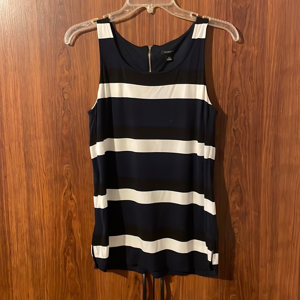 Sleeveless white, navy, and black striped blouse